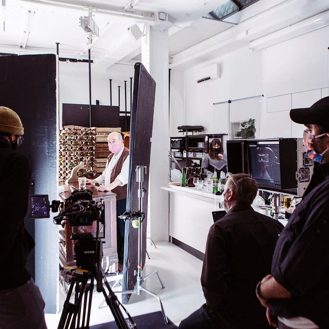 Behind-the-scenes video shoot setup with cameras and crew at Icetank for events. - Banner
