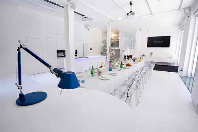 Modern corporate event space with sleek decor, ideal for meetings and workshops.