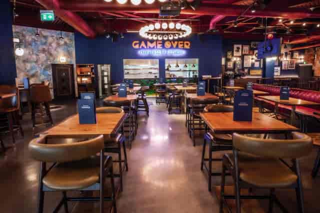 Christmas event space with vibrant decor and flexible seating for corporate gatherings.