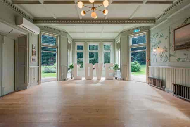 Private Garden Room at Worplesdon Place with "LOVE" letters, perfect for weddings and gatherings.