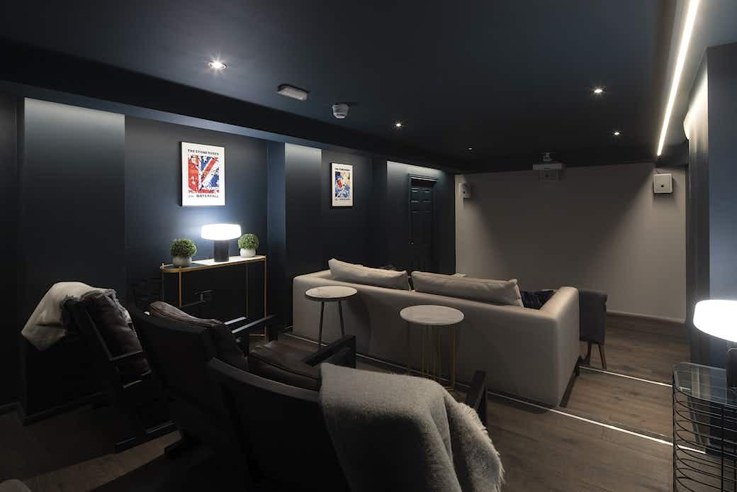 Sleek Rathbone Lounge with dim lighting, perfect for networking and casual meetings.