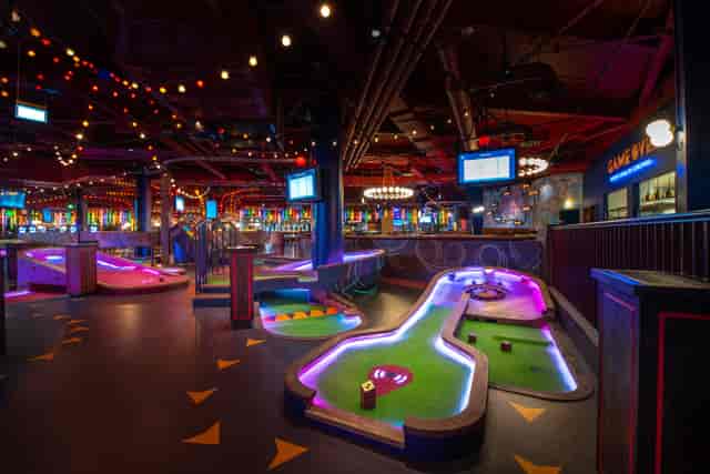 "Christmas-themed mini-golf venue for corporate events and team-building activities."