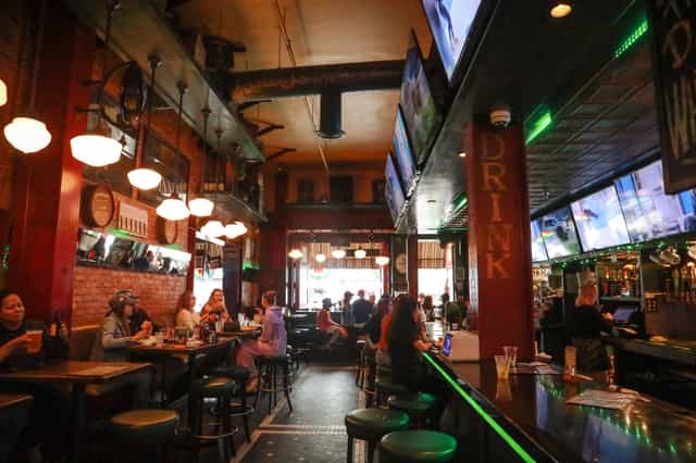 Vibrant bar at Jameson's Irish Pub, perfect for networking events and casual meetups.