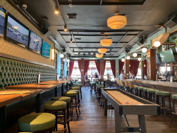 Vibrant Hollywood event space in Jameson's Irish Pub with shuffleboard and stylish decor.