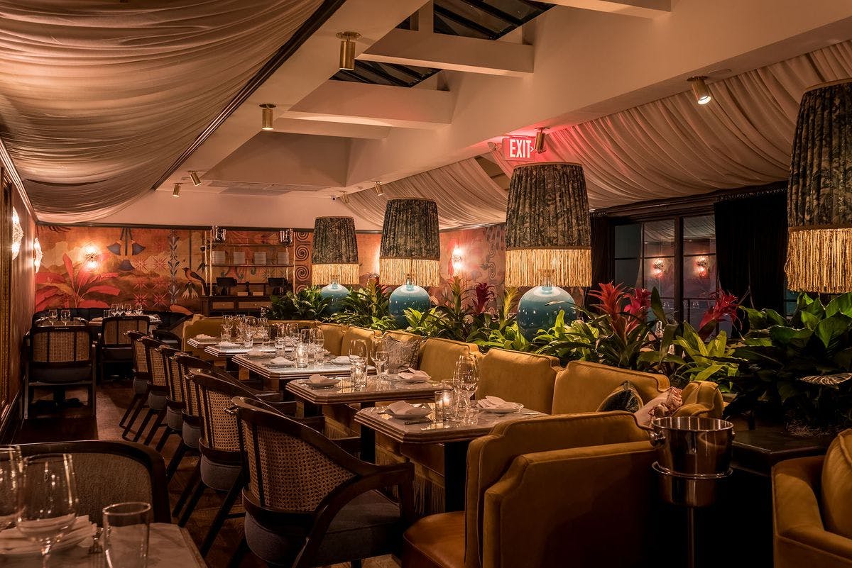Stylish bar area in Olivetta, perfect for intimate gatherings and corporate dinners.