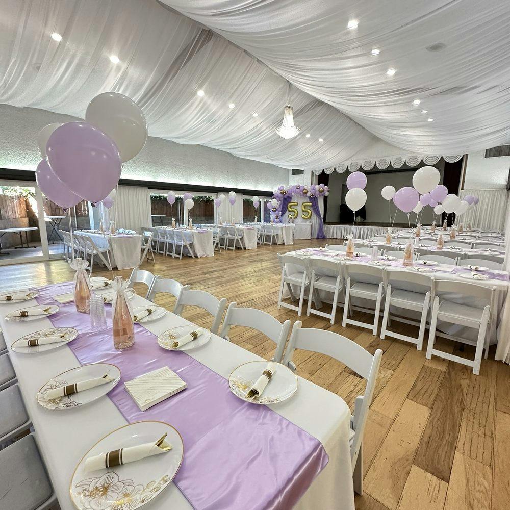 Elegant Pure Banquet Hall foyer with lavender decor, perfect for celebrations and events.