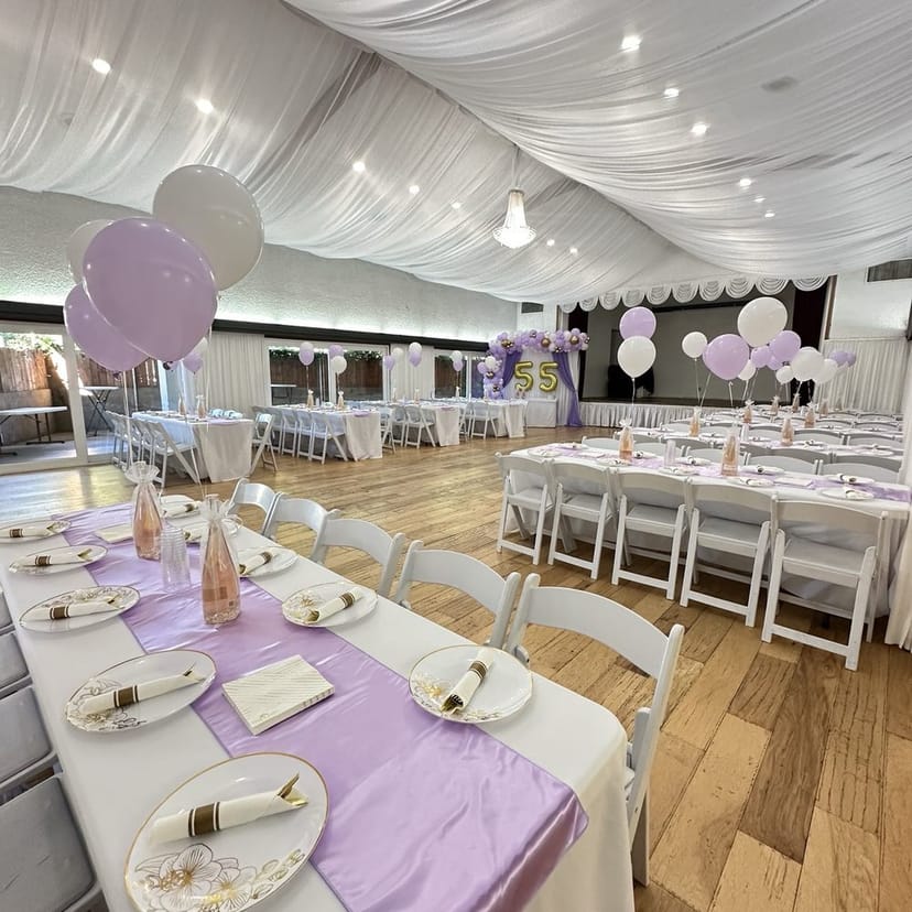 Elegant Pure Banquet Hall foyer with lavender decor, perfect for celebrations and events.