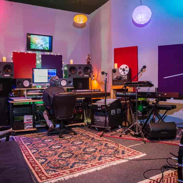 RZN Recording Studio with vibrant lighting, ideal for music events and workshops.