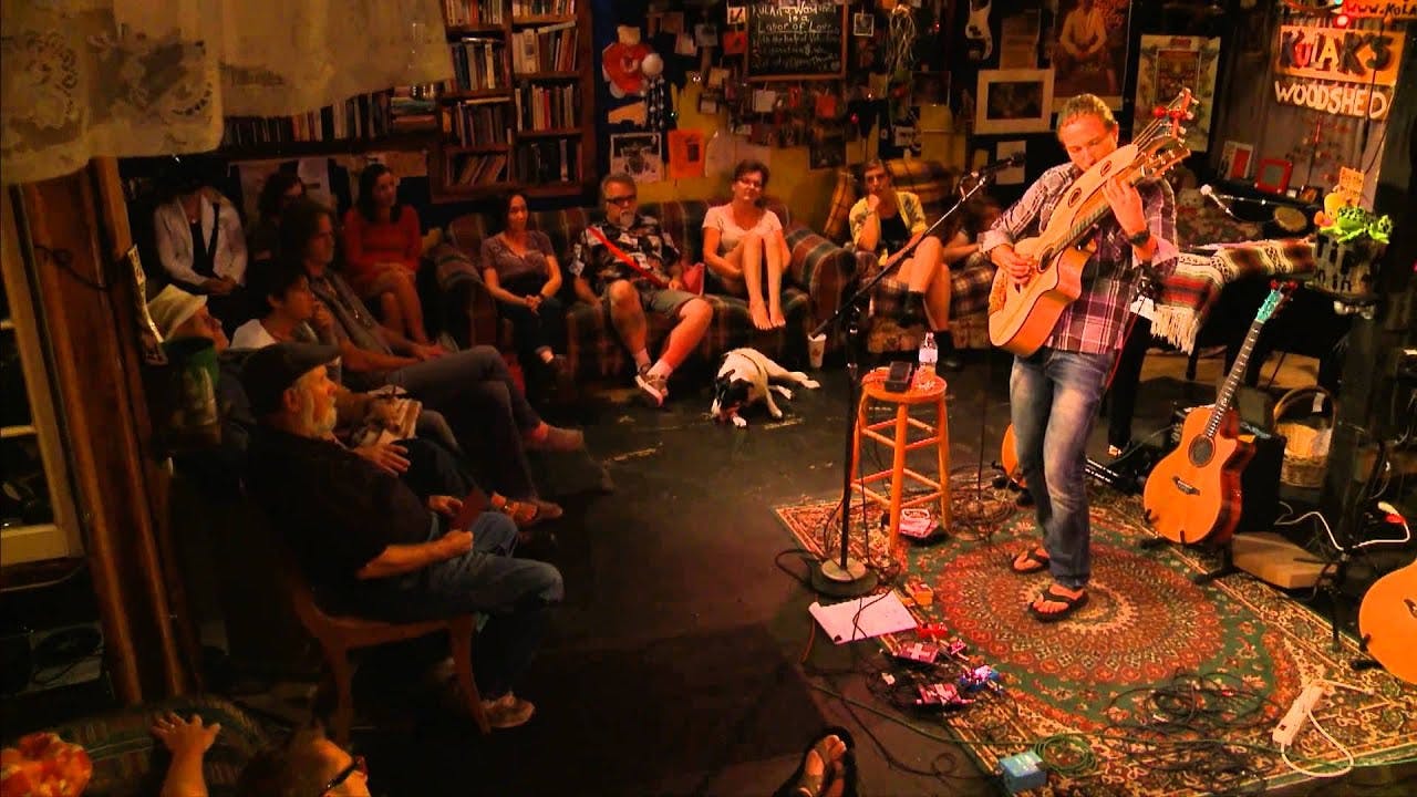 Intimate live performance at Kulak's Woodshed with cozy ambiance and audience engagement.