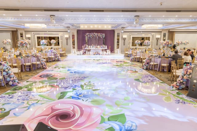 Glenoaks Ballroom with floral floor design, ideal for weddings and upscale events.