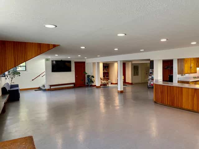 Spacious community center in Finnish Hall, ideal for events and meetings with modern design.
