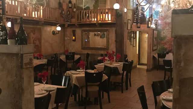 Cozy dining area at Aliotta's Via Firenze, perfect for intimate events and celebrations.