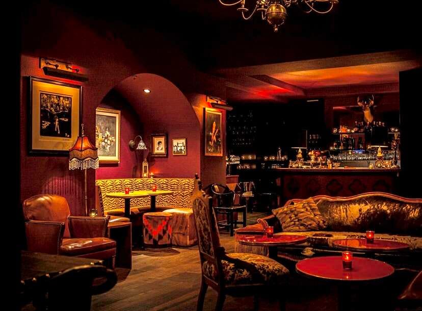 Stylish lounge with warm lighting, ideal for networking events and cocktail receptions.