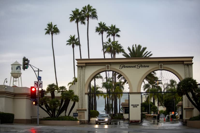 Glamorous entrance at Paramount Pictures Studios for upscale events with lush palm trees.