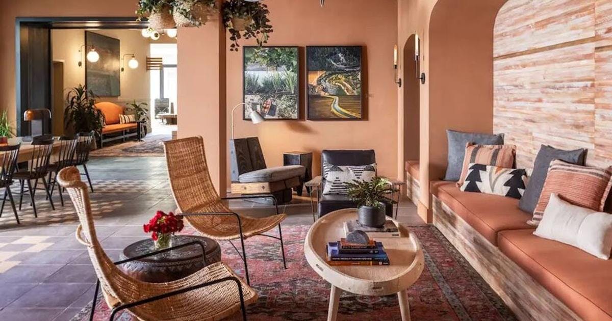 Stylish TV Lounge at El Capitan Hotel, perfect for networking events and informal meetings.