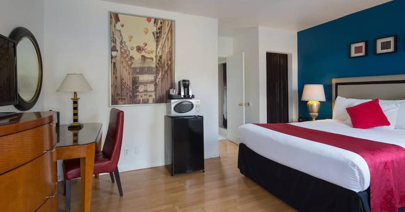 Colorful hotel room at Alpine Inn & Suites, perfect for business events and relaxation.