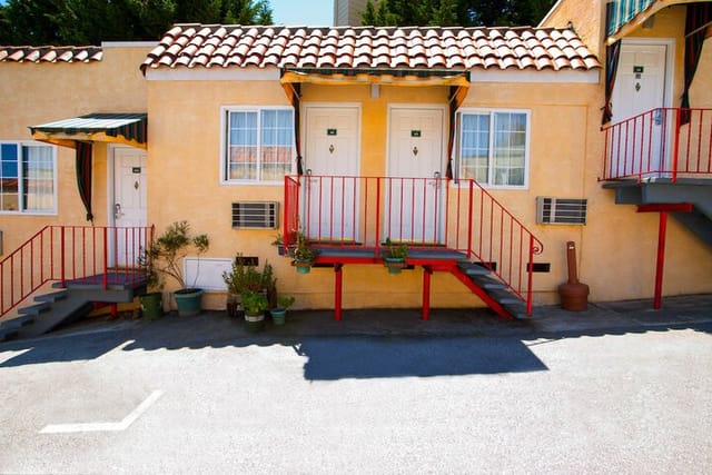 Colorful Mediterranean-style Alpine Inn & Suites, ideal for intimate events and gatherings.
