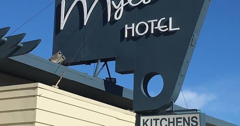 Vintage hotel sign at Mylo Hotel, perfect backdrop for unique events and gatherings.