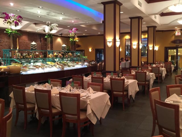 Banquet Hall in La Belvedere with elegant tables, ideal for events and celebrations.