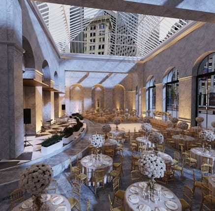 Elegant event space with floral centerpieces, ideal for weddings and corporate functions.