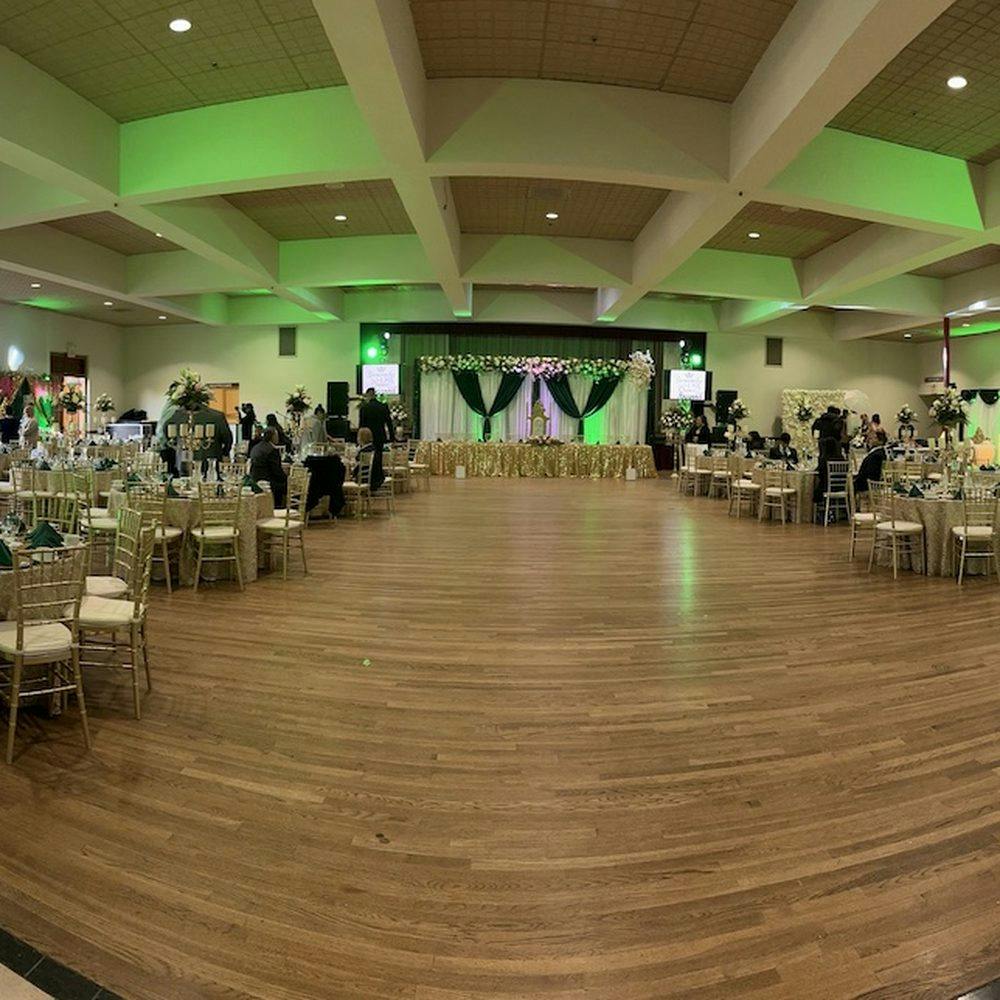 Elegant event venue at Lake Merced Boathouse with floral decor, ideal for weddings and corporate events.