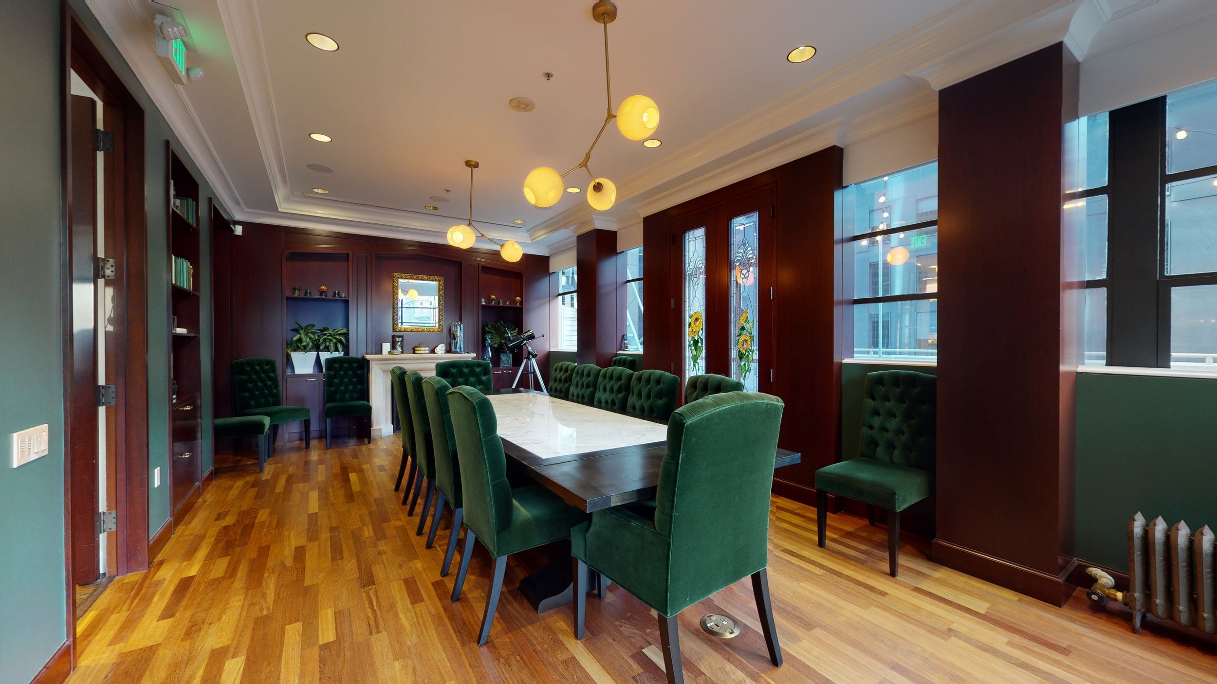 Sophisticated conference room with green chairs, perfect for meetings and workshops.