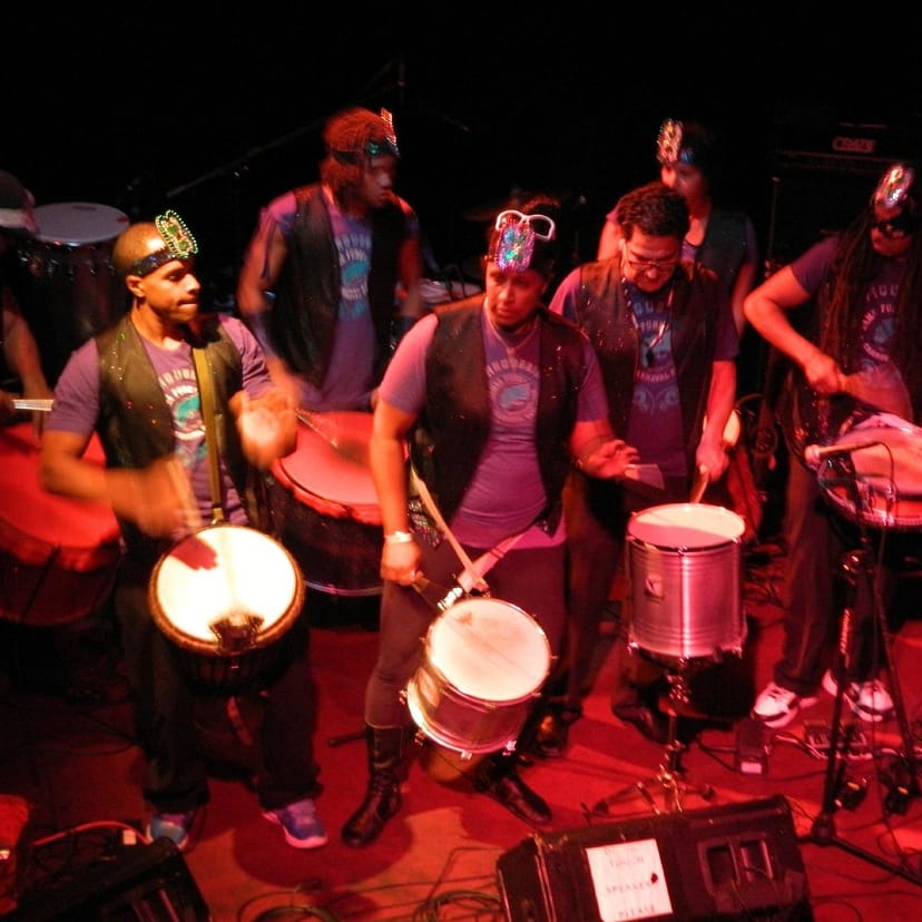 Outdoor patio drumming performance at The New Parish, ideal for lively events and celebrations.