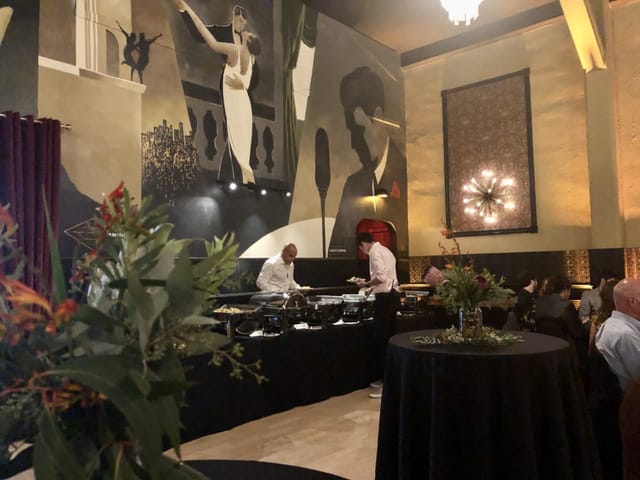 Elegant banquet hall with floral centerpieces, perfect for upscale events and networking.
