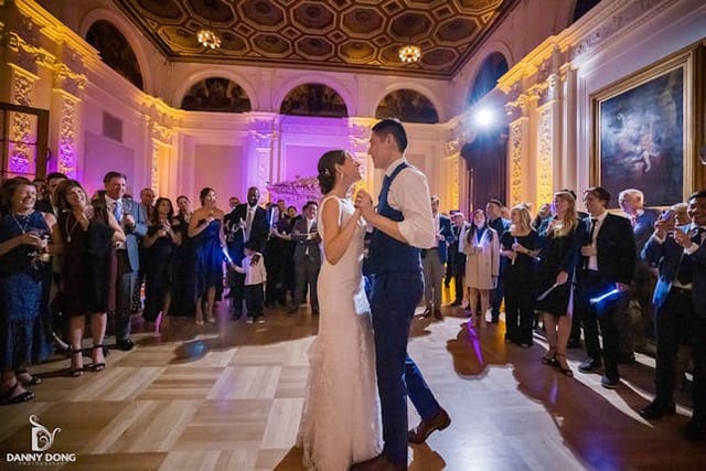 Wedding reception in elegant Flood Mansion ballroom with couple's first dance.
