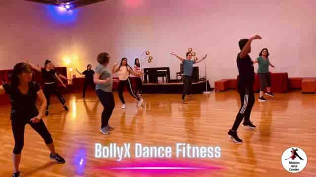 BollyX Dance Fitness class in vibrant, spacious venue for wellness events and team building.