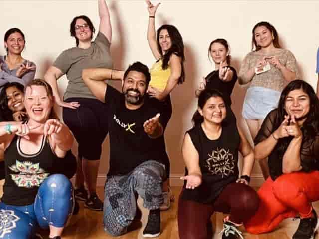 BollyX Fitness event with diverse participants showcasing energy and community engagement.