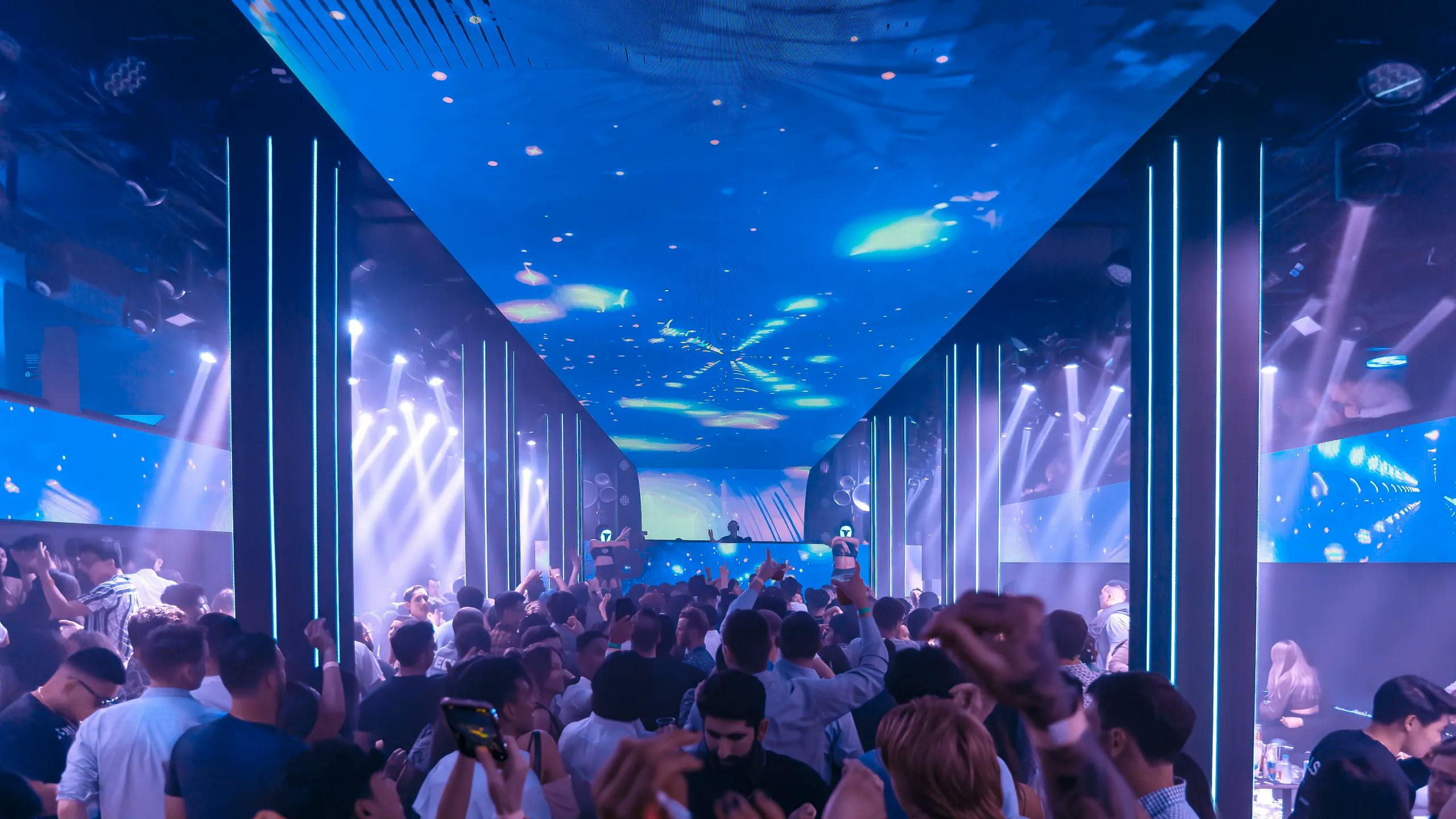 EcoSystem Coworking at Temple Nightclub, vibrant event space with dynamic lighting for networking.