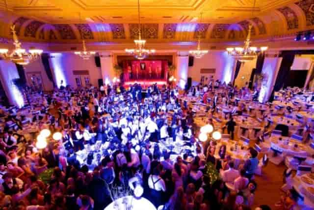 Vibrant gala in Oakland Scottish Rite Center's grand ballroom, perfect for corporate events.