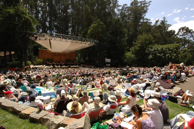 Main Stage at Stern Grove Festival with audience enjoying a concert under shaded canopy.