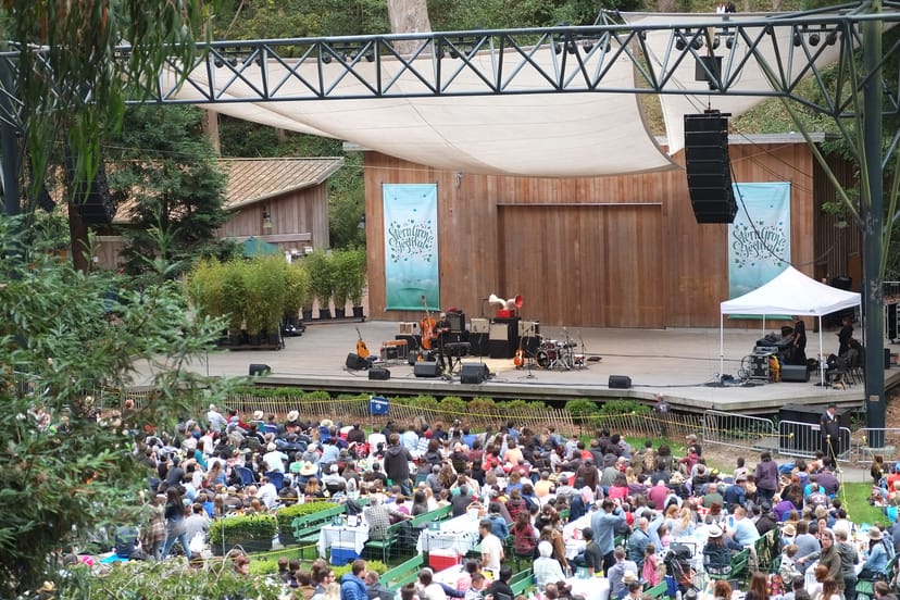 Main Stage at Stern Grove Festival, wooden stage, outdoor concert venue with audience.