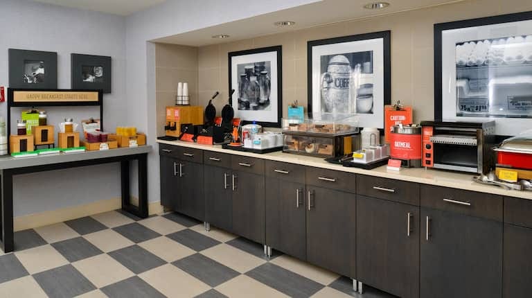 Refreshment station at Hampton Inn Daly City for meetings and events, featuring coffee and snacks.