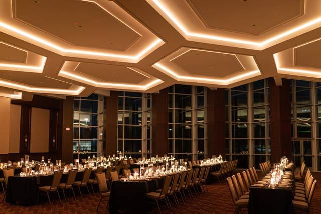 Elegant banquet hall in Colombo Club, featuring hexagonal ceiling for formal events.