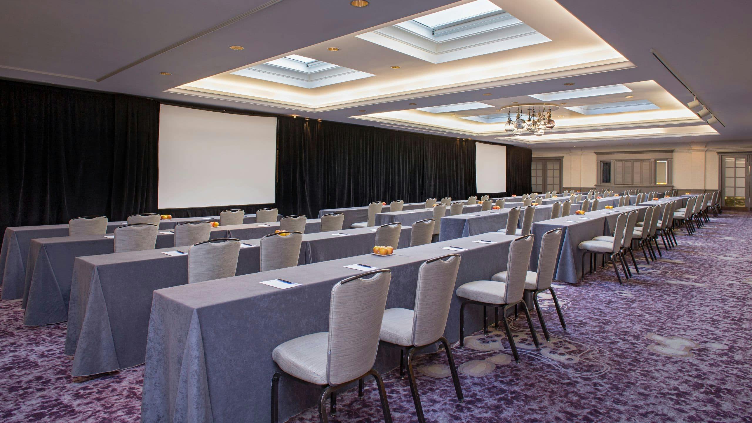 Top floor event space at Amador Club, featuring a large screen for conferences.
