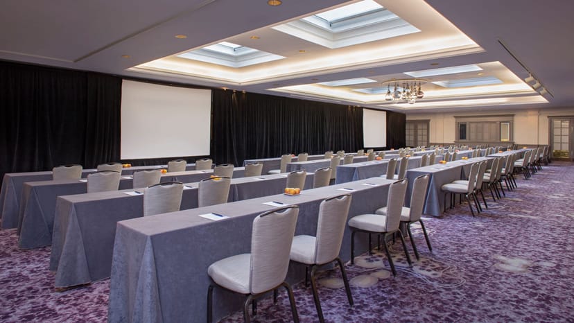 Top floor event space at Amador Club, featuring a large screen for conferences.