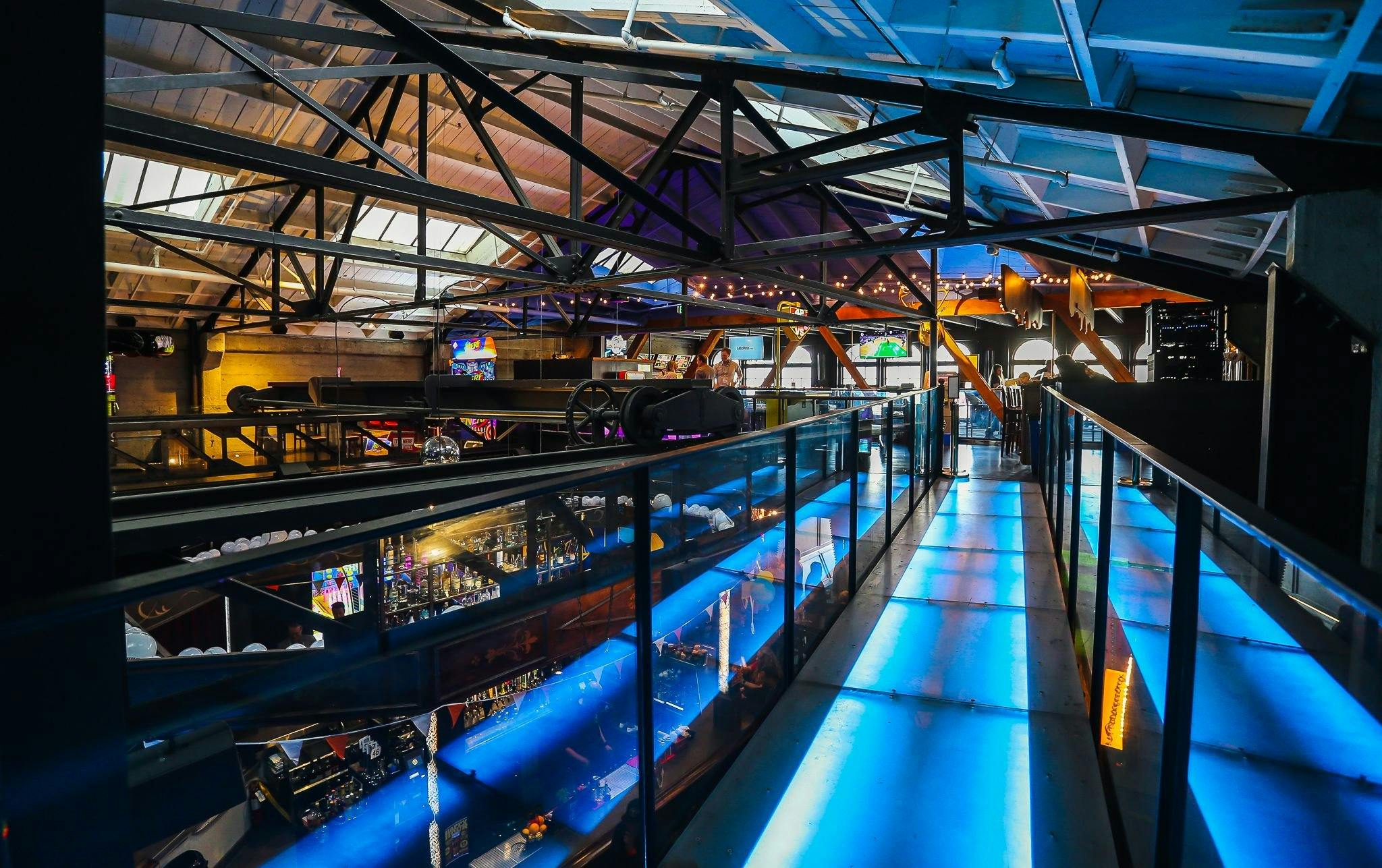 Vibrant 2nd Floor event space with balcony, ideal for conferences and parties.