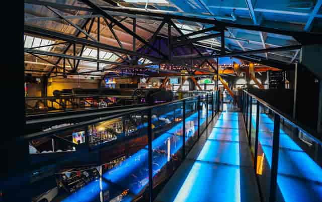 Vibrant 2nd Floor event space with balcony, ideal for conferences and parties.