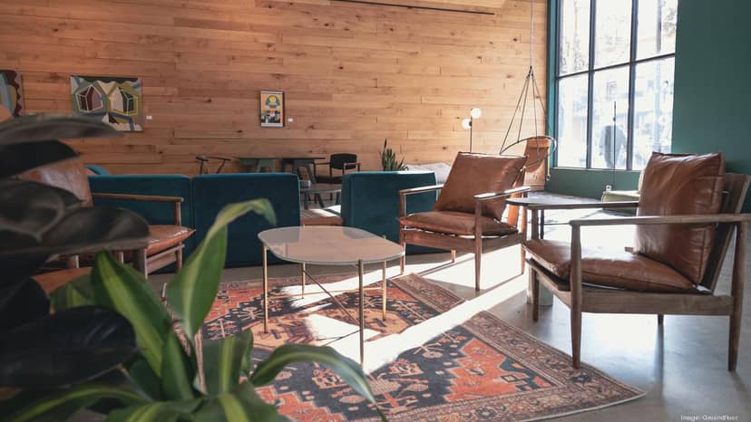Stylish lounge area in Wellness Space, ideal for networking events and informal meetings.