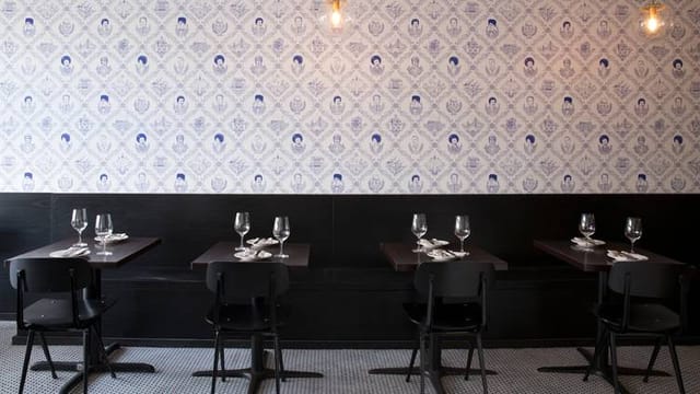 Large table in Fiorella, modern dining space for intimate gatherings and events.