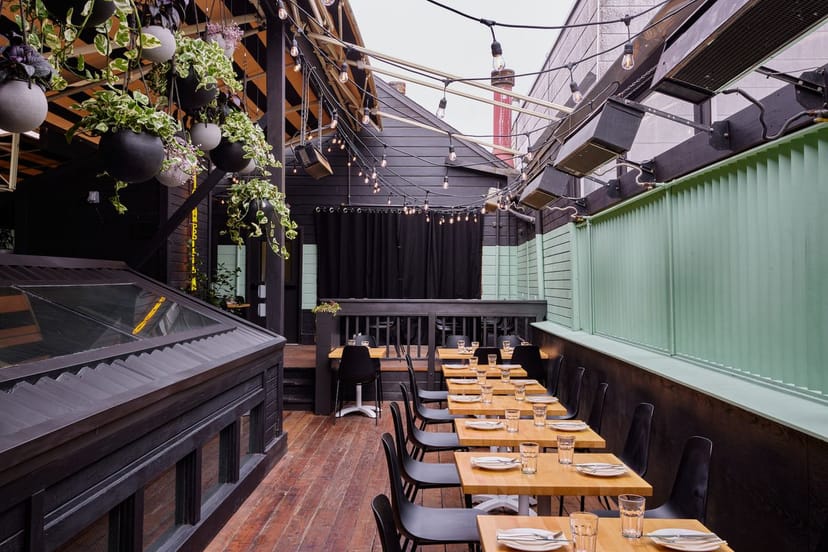 Large outdoor dining table in Fiorella, perfect for events and gatherings.
