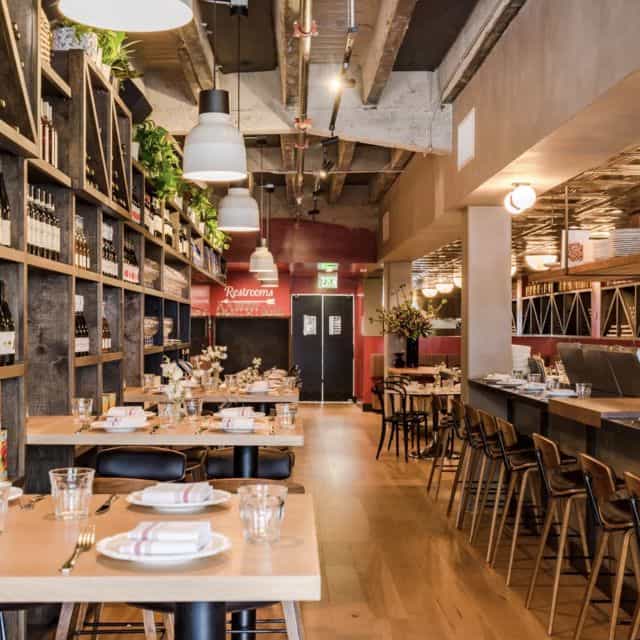 Private dining room at Che Fico Restaurant, elegant decor for intimate events.