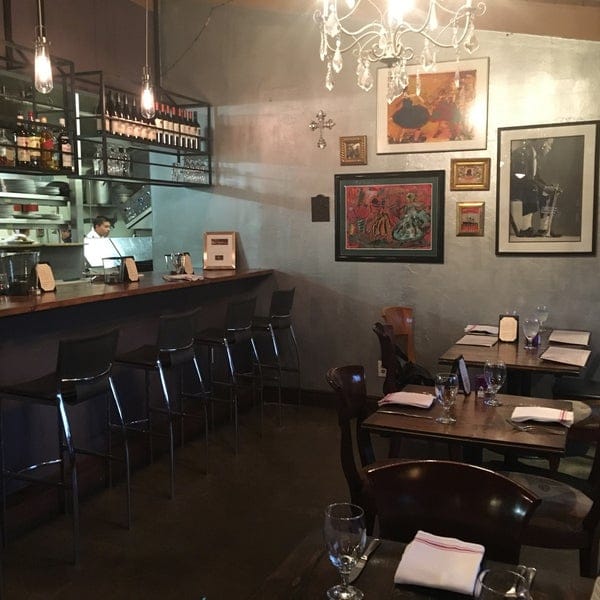 Stylish bar at CreoLa Bistro, ideal for private events and networking dinners.