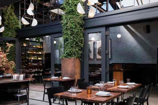 Stylish restaurant in Penny Roma with modern decor, ideal for networking events and private dinners.