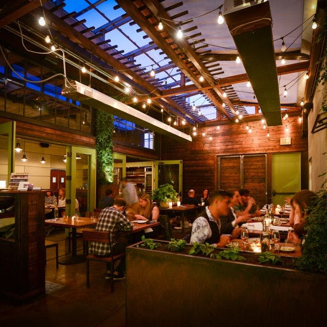 Vibrant restaurant setting with rustic decor for intimate gatherings and networking events.