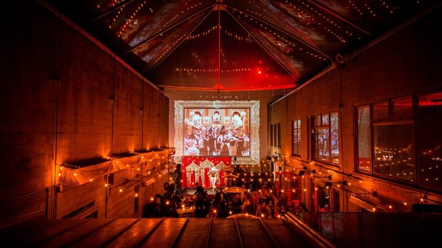 Amate Terrace at Foreign Cinema, warm string lights for networking and celebrations.