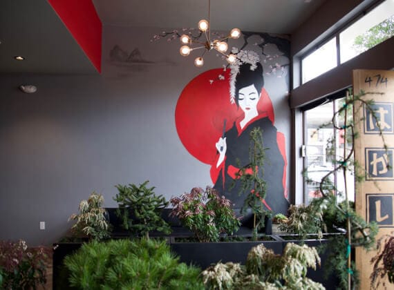 Stylish Hakashi Japanese Bar & Grill with mural, ideal for themed events and gatherings.